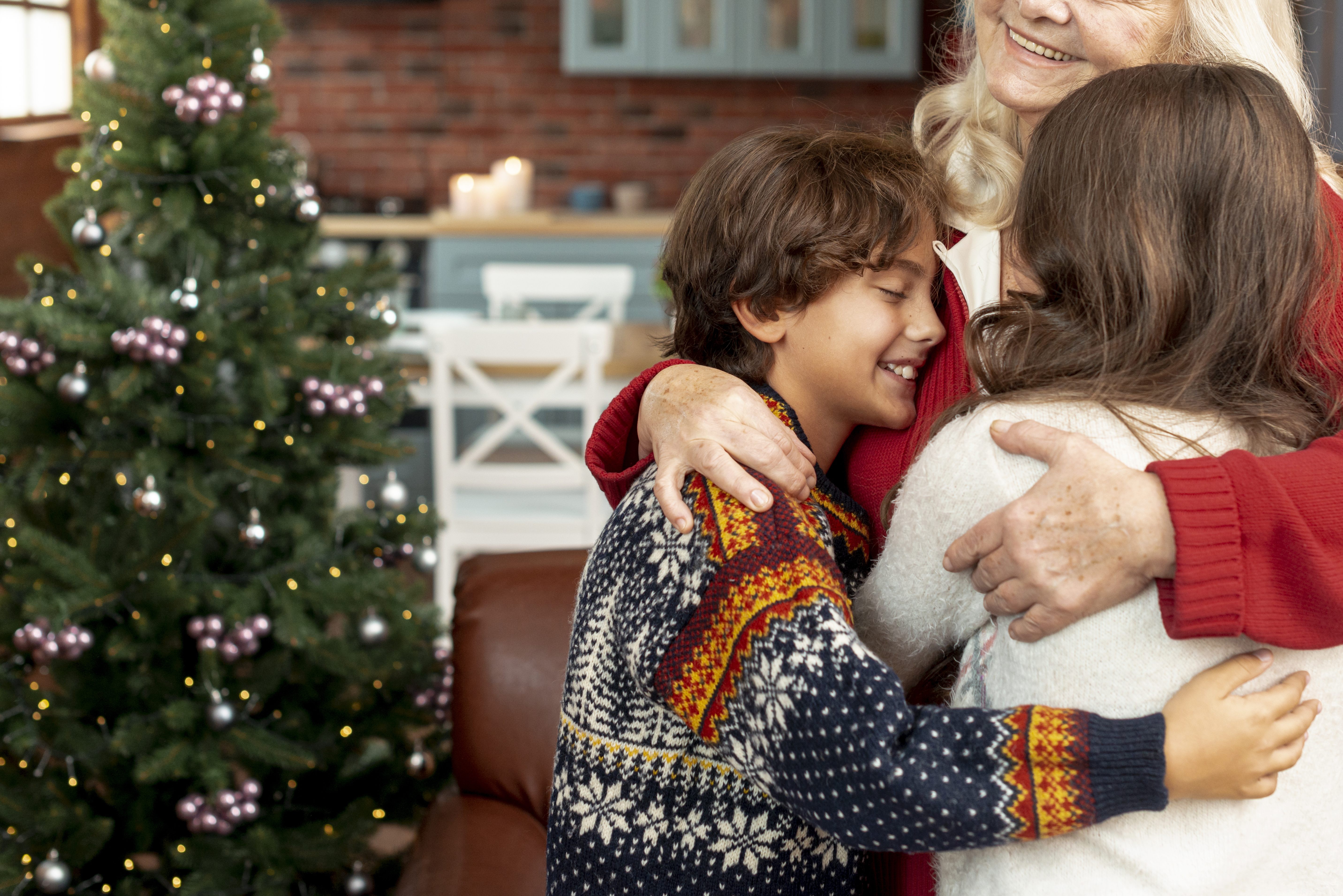 close-up-happy-grandmother-hugging-grandchildren.jpg